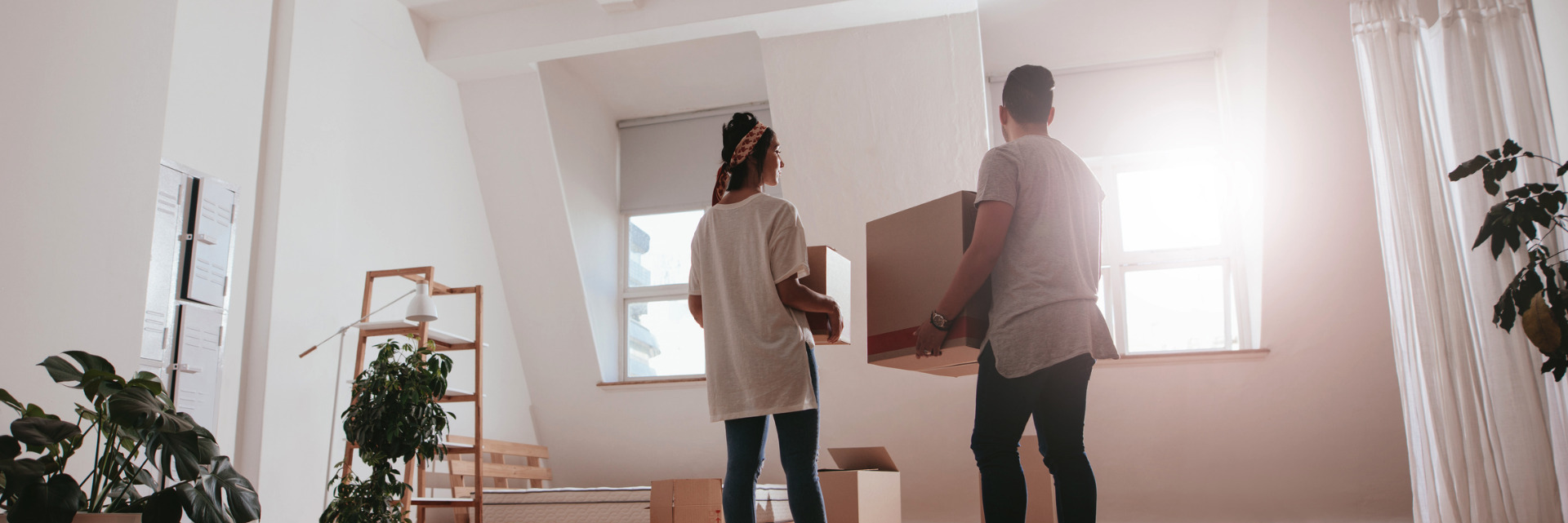 Young expats moving into a new apartment in Muscat , Oman